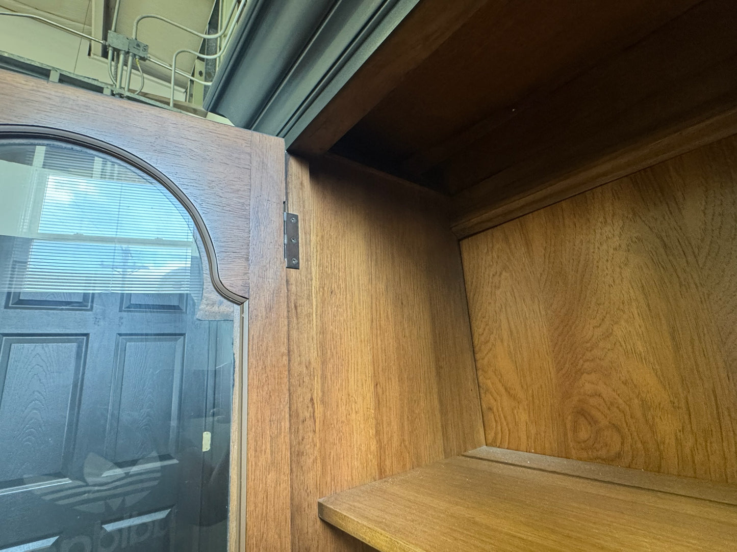 Black Hutch with Arched Doors and Wood Base