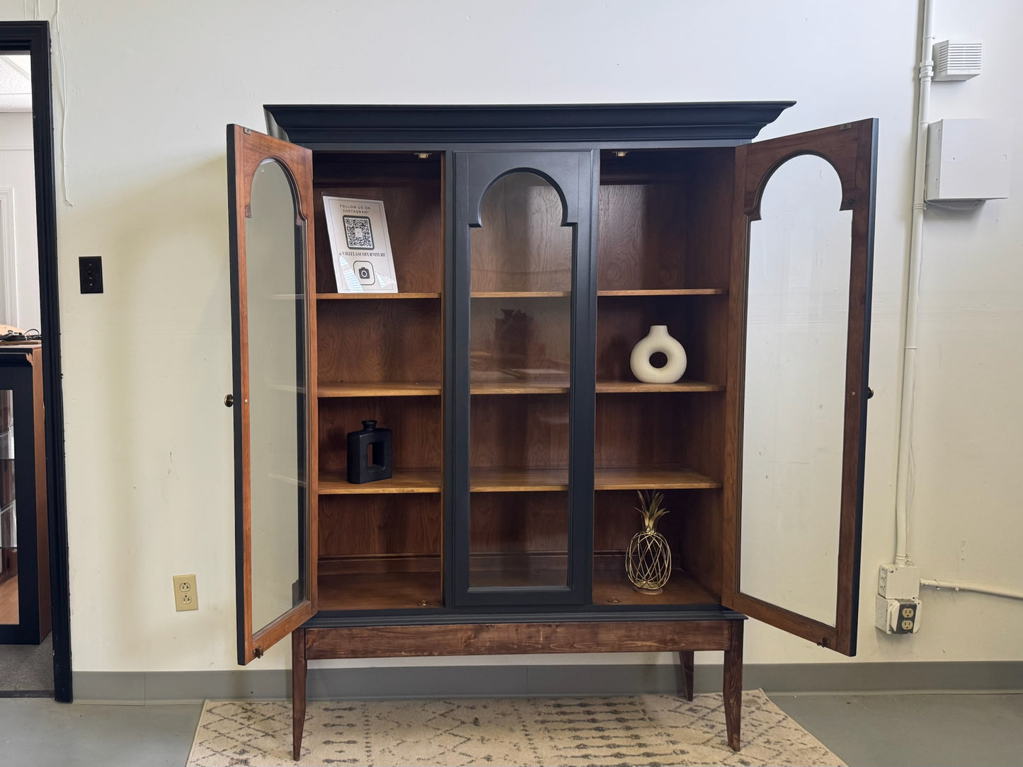 Black Hutch with Arched Doors and Wood Base