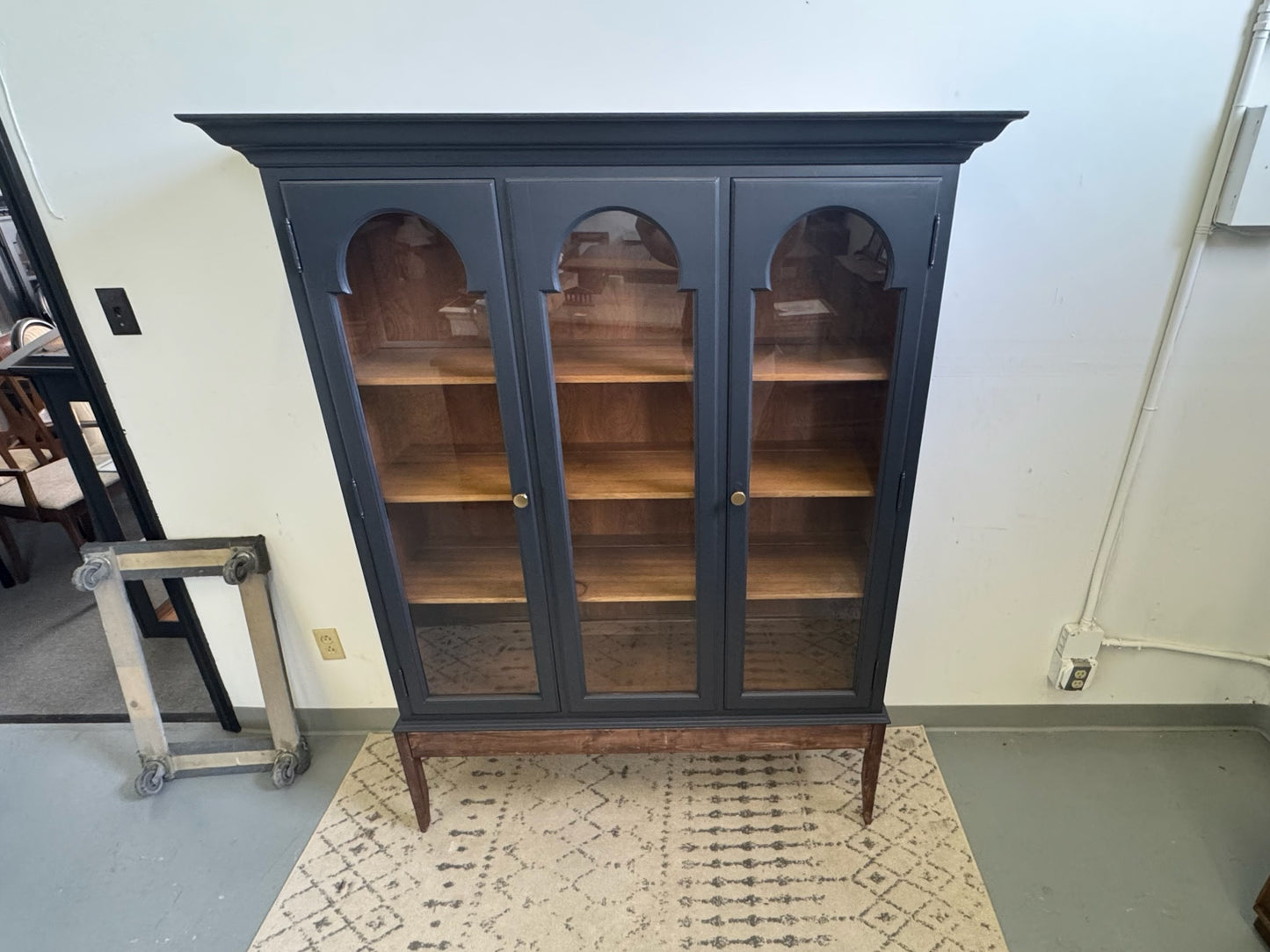 Black Hutch with Arched Doors and Wood Base