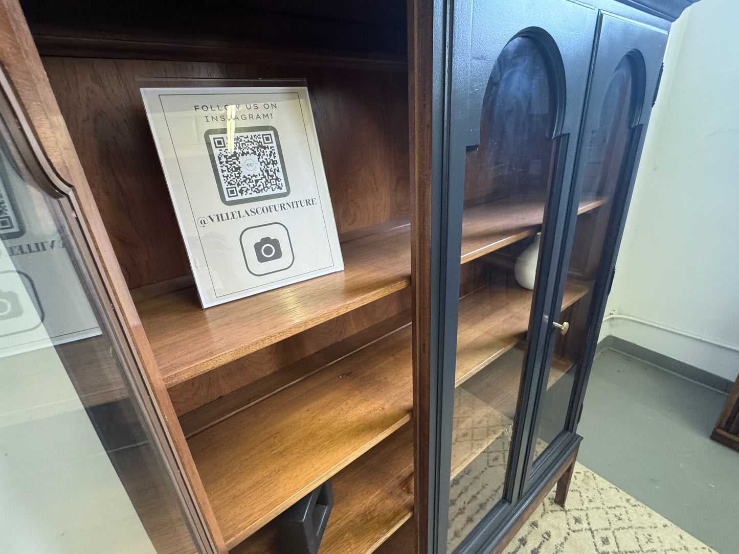 Black Hutch with Arched Doors and Wood Base